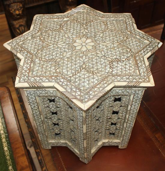 An Islamic mother of pearl and bone inlaid low occasional table, W.1ft 6.5in.